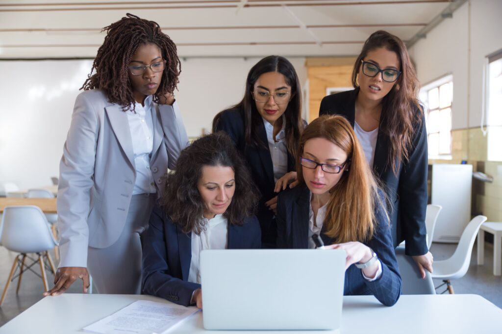 businesswomen using laptop in office
