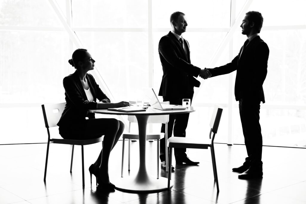 corporate workers completing a deal