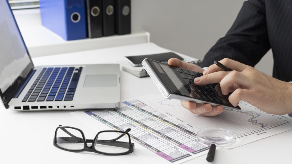 businessman calculating finances