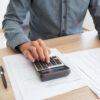 individual calculating finances