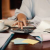 worker calculating finances