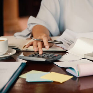 worker calculating finances