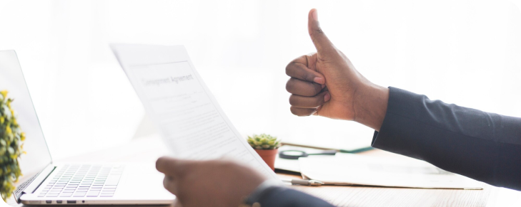 businessman giving approval gesture