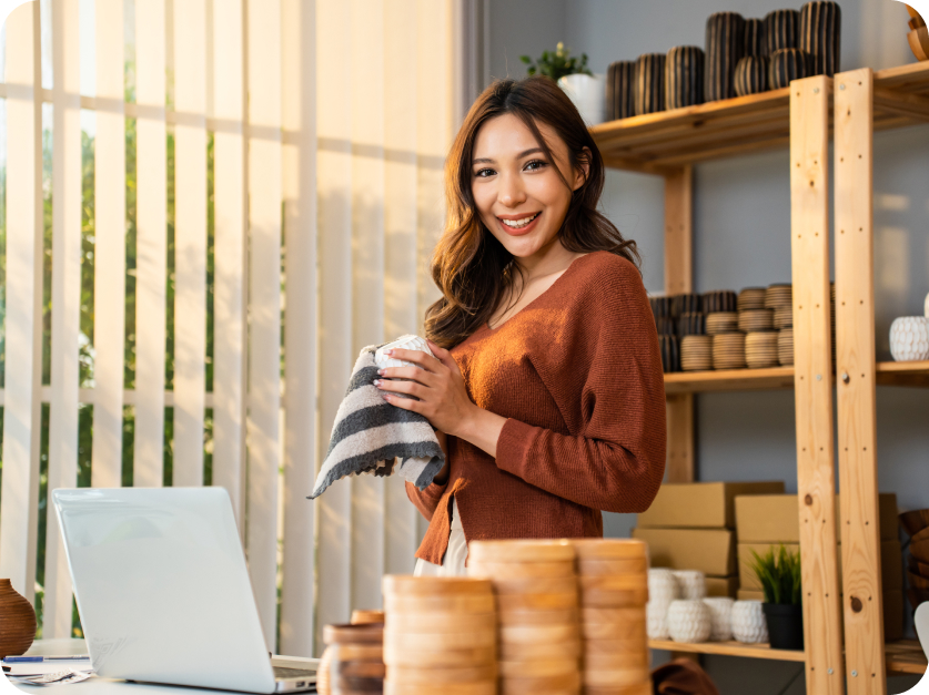 office worker cleaning mug at desk
