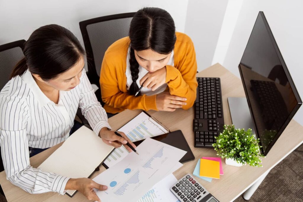 female workers discussing tasks