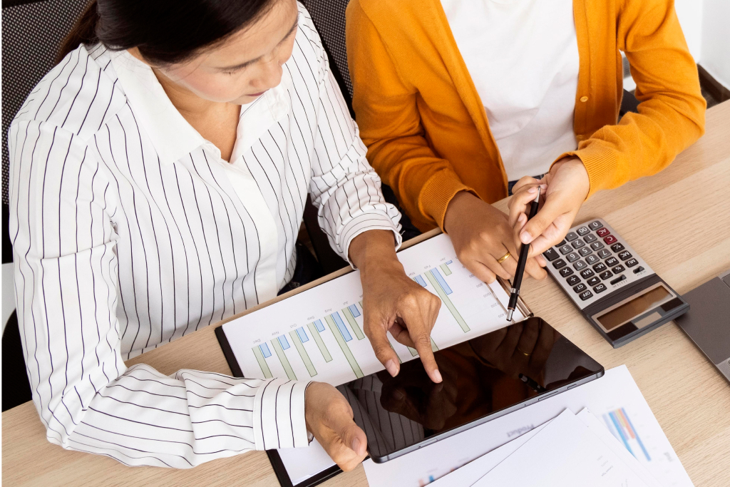 workers discussing tablet content
