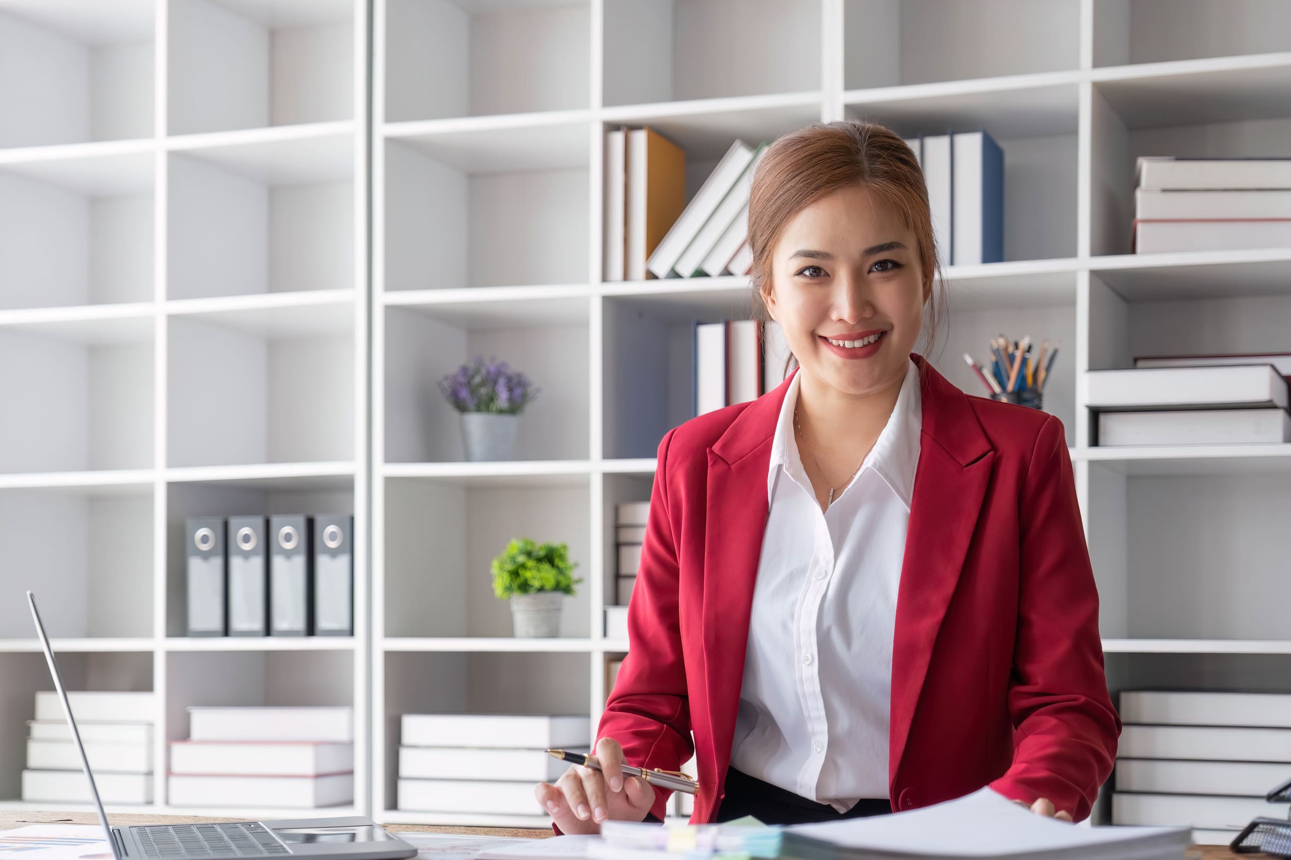 professional secretary in red coat