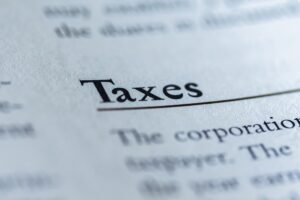 Detailed view of a legal textbook page highlighting the section on corporate taxes