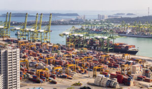Elevated view of container terminal, cranes and container ship, Singapore, South East Asia