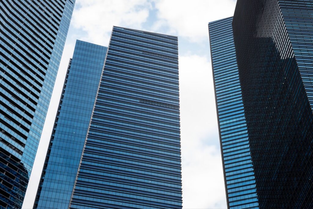 Modern skyscrapers in Singapore's central business district where companies pay corporate tax Singapore