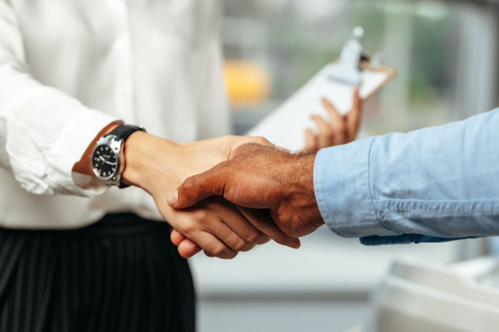 two men handshaking